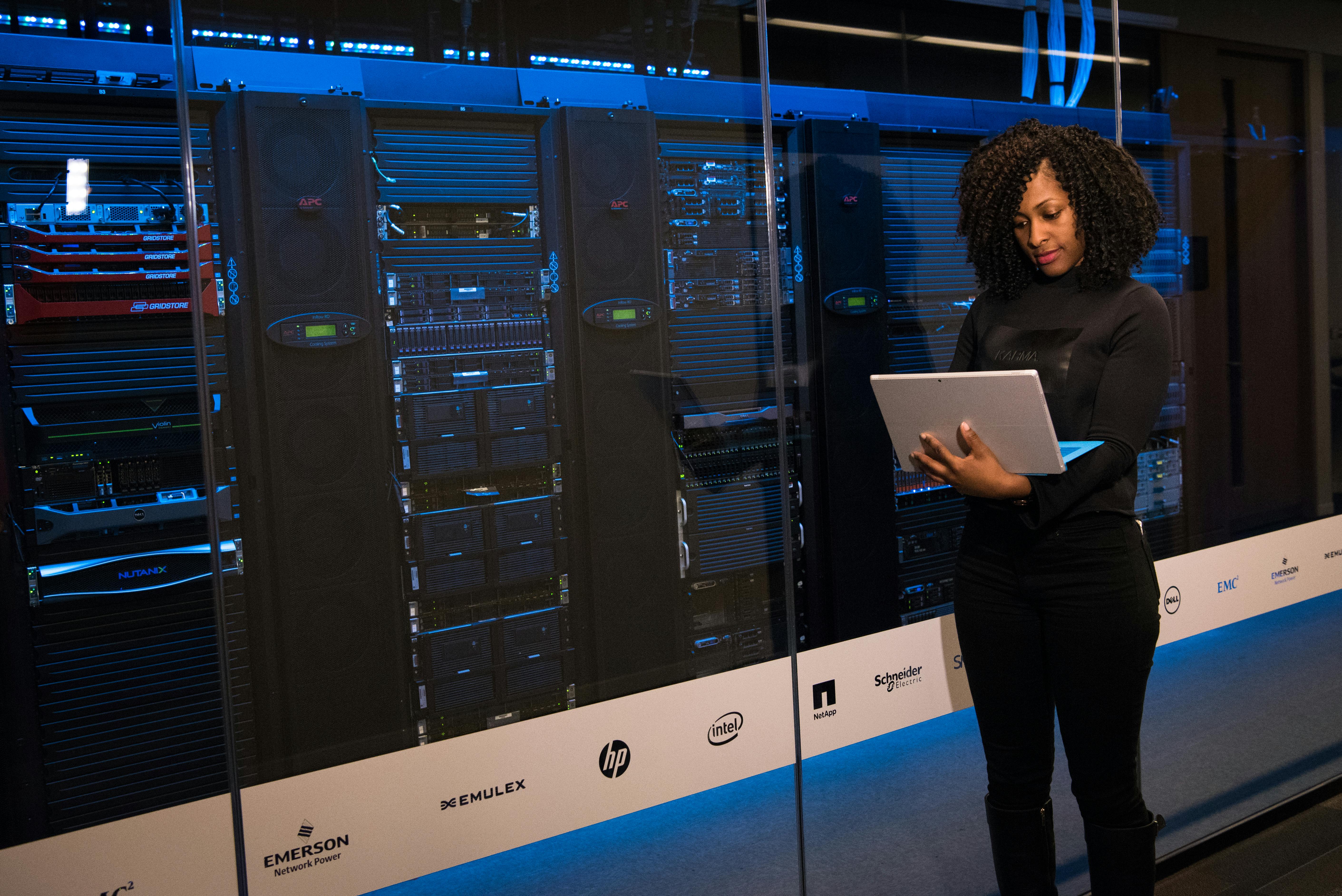 Support team monitoring digital display uptime