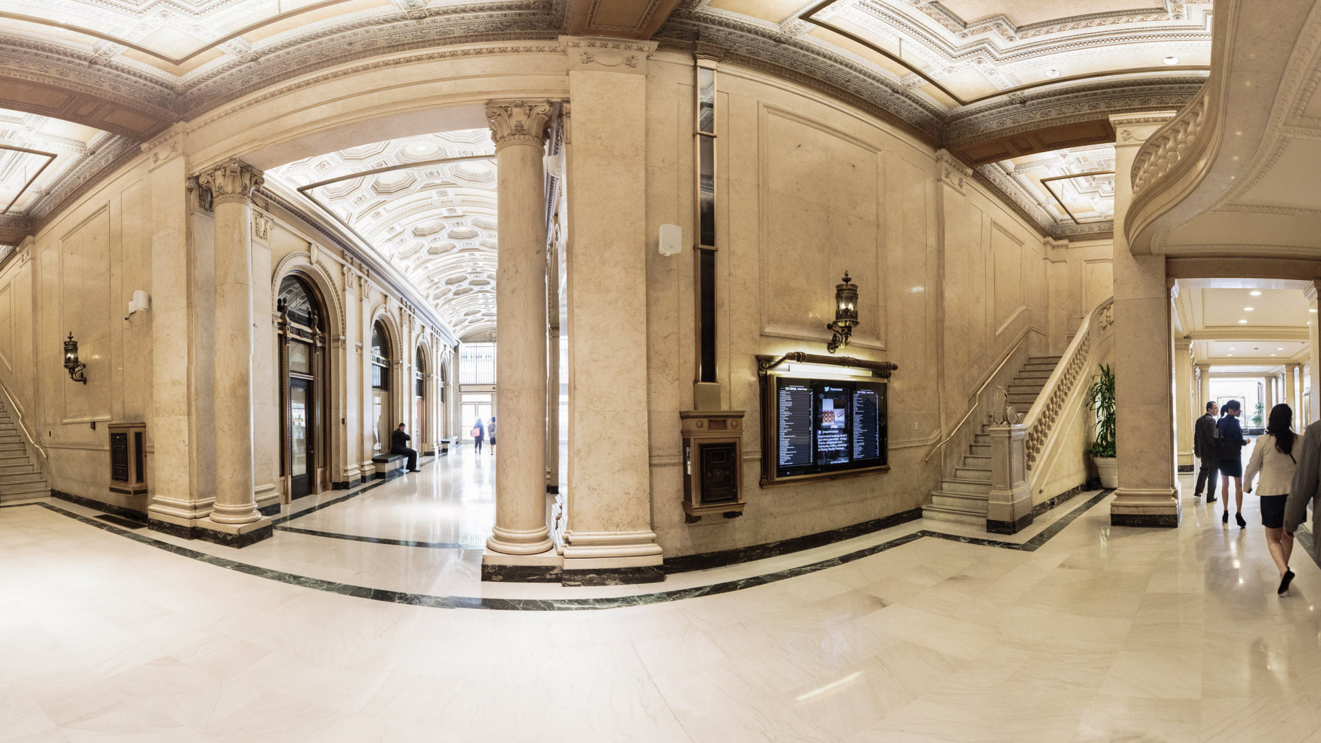 large hall view with a display on a far wall