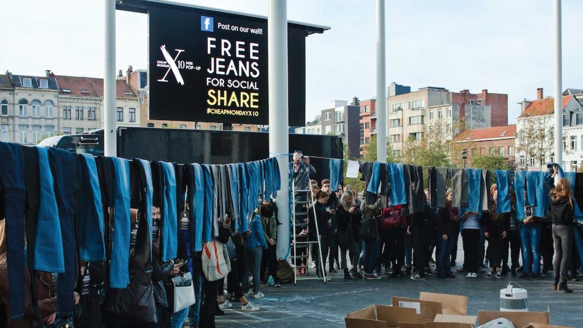 event with jeans hanging on clotheslines