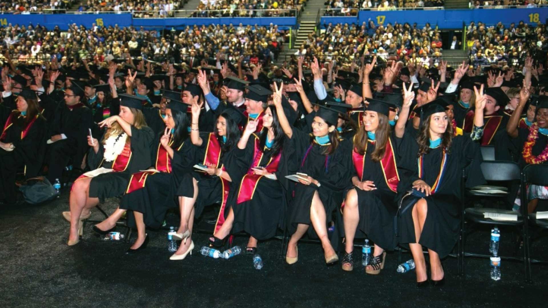 crowd sitting at graduation ceremony