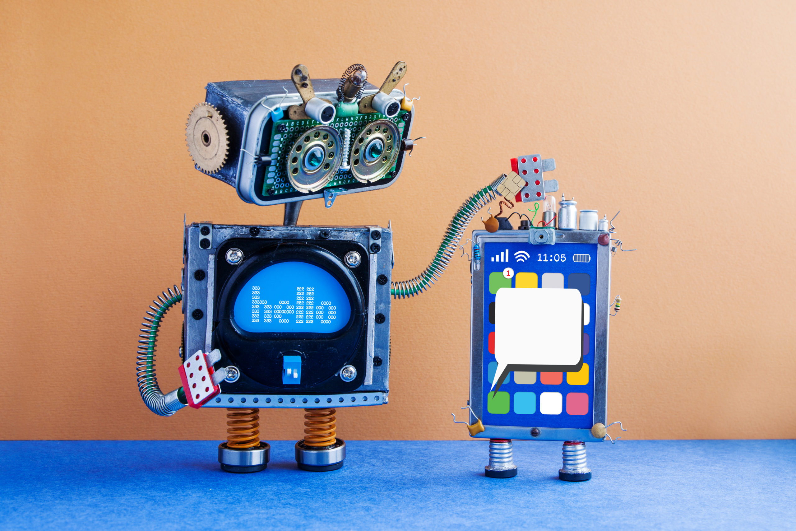 a robot with a robotic phone