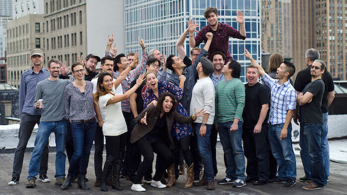 group of coworkers outside celebrating