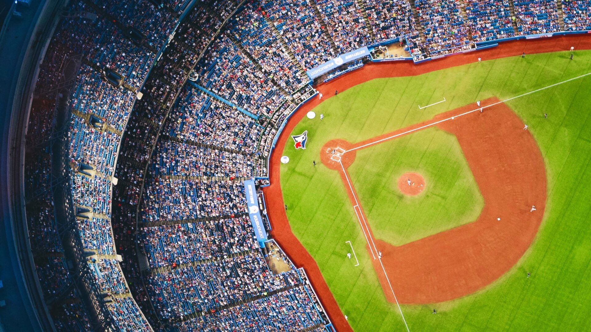 high overhead view of a full baseball stadium