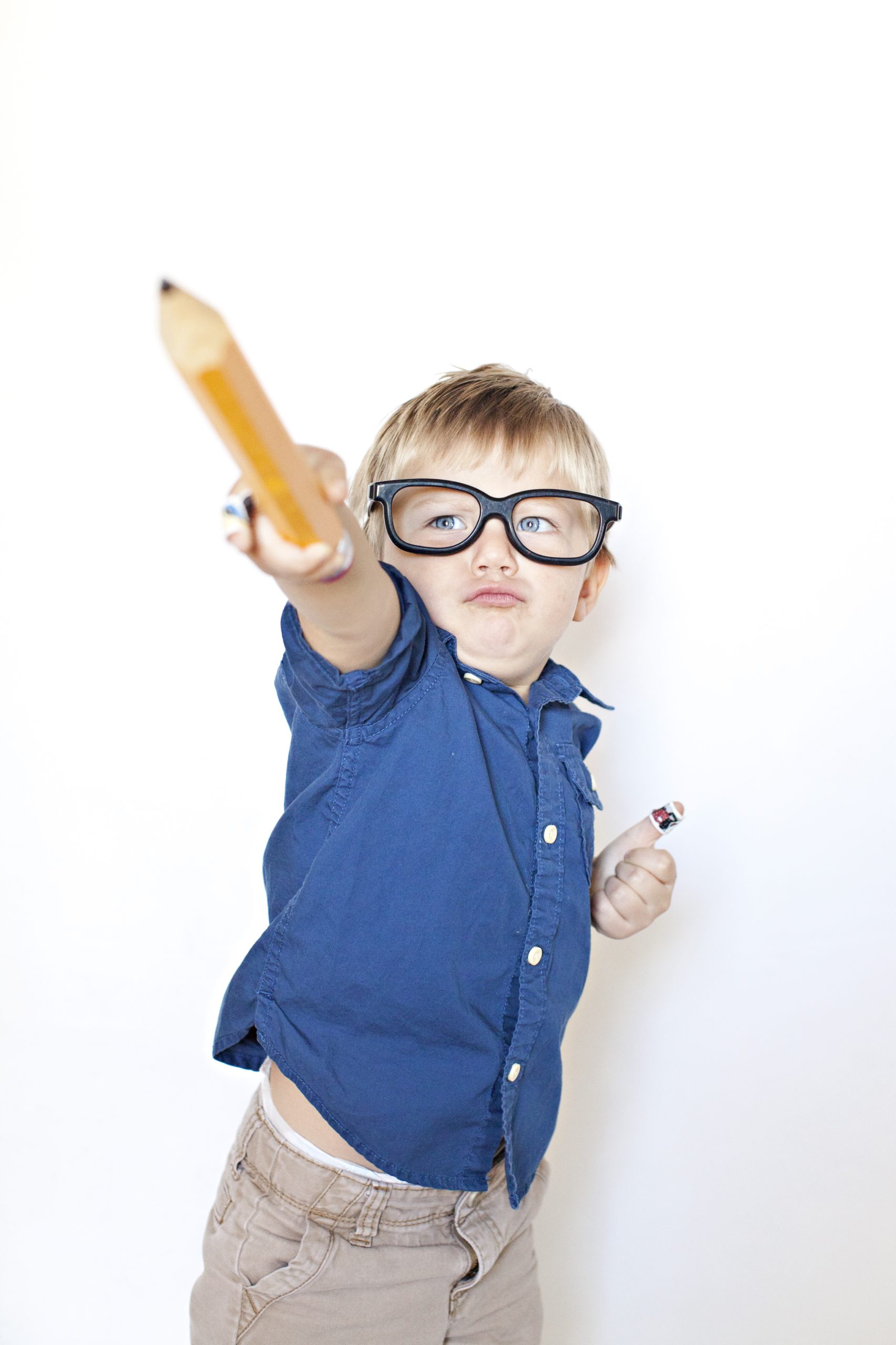 boy with a giant pencil