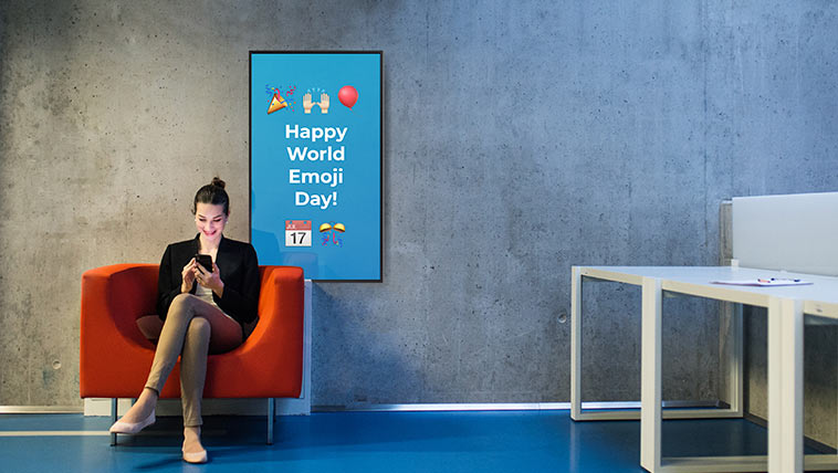 woman Sitting in Front of digital signage