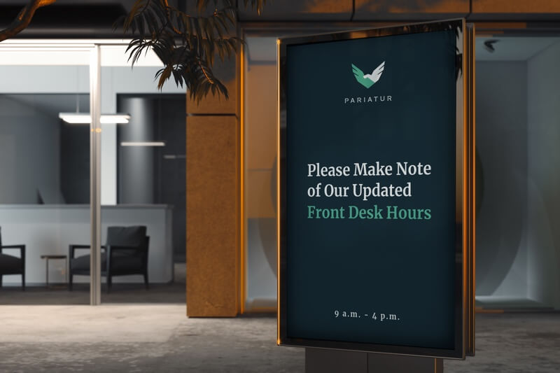 COVID-19 digital signage template on an office building screen displaying updated front desk hours