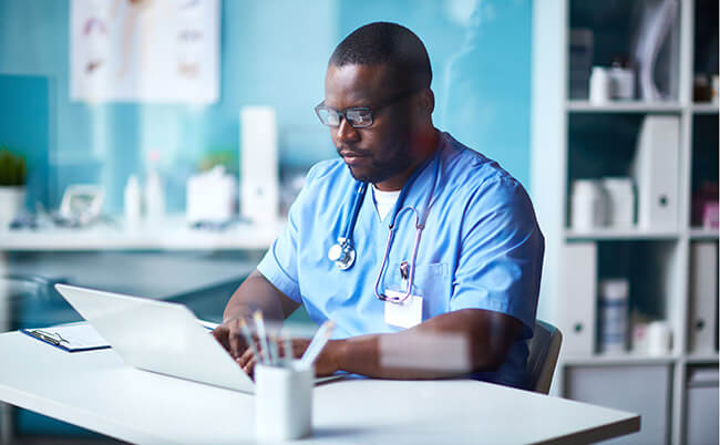 hospital worker at computer