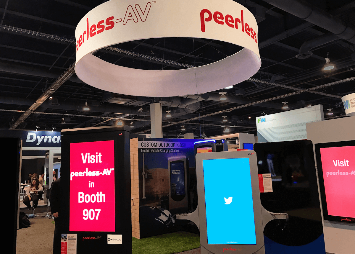 many digital displays set up at a trade show