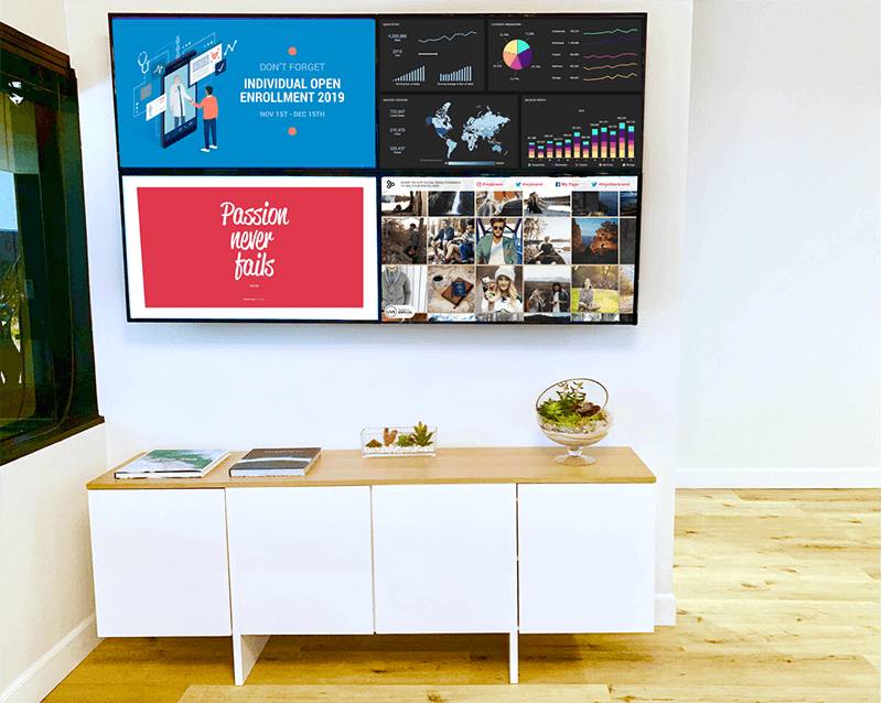 video wall behind a desk in an office lobby