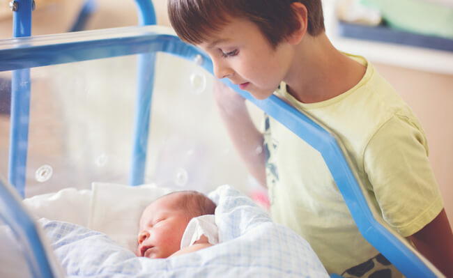 Visiting newborn in hospital