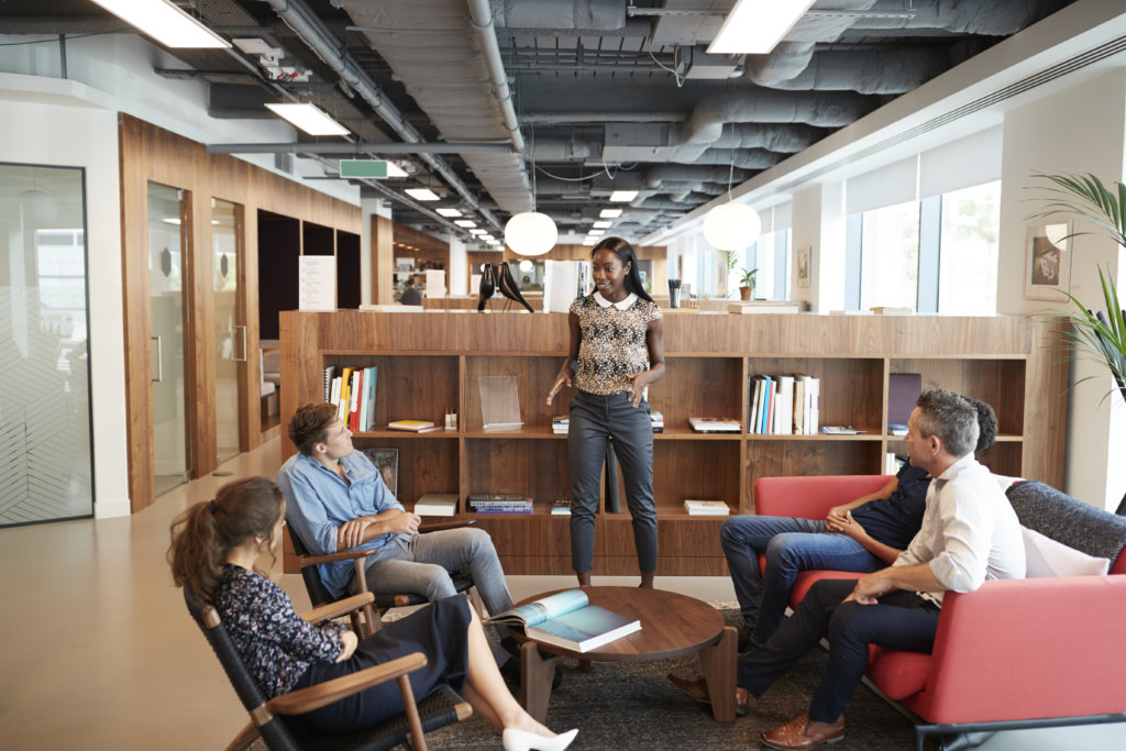 coworkers having a meeting in a laidback meeting area