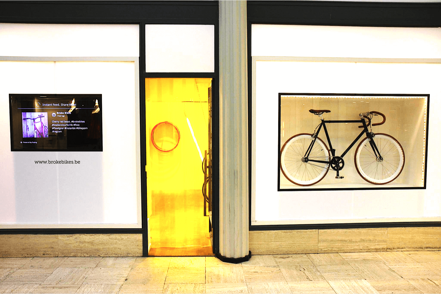 Broke Bikes retail store uses digital signage powered by Enplug software in their storefront.