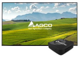 Display with AGCO logo over a farm image