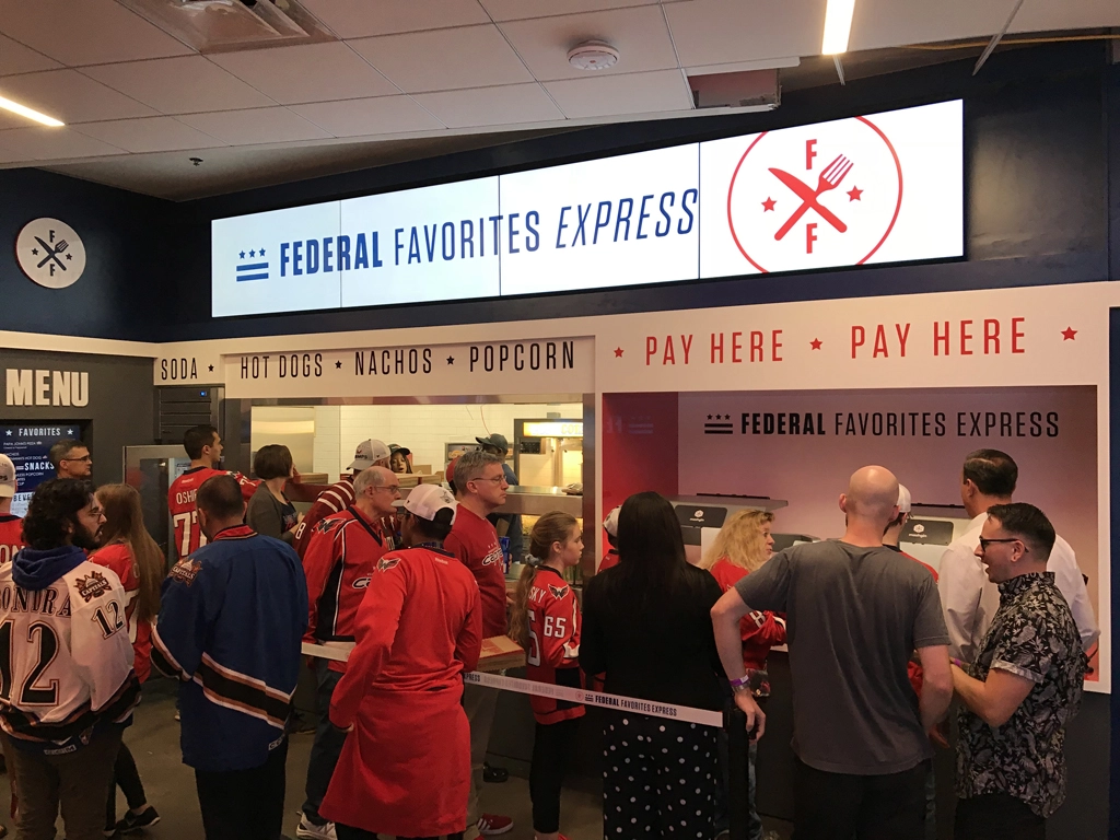 photo of concession stands with digital signage at capital one arena