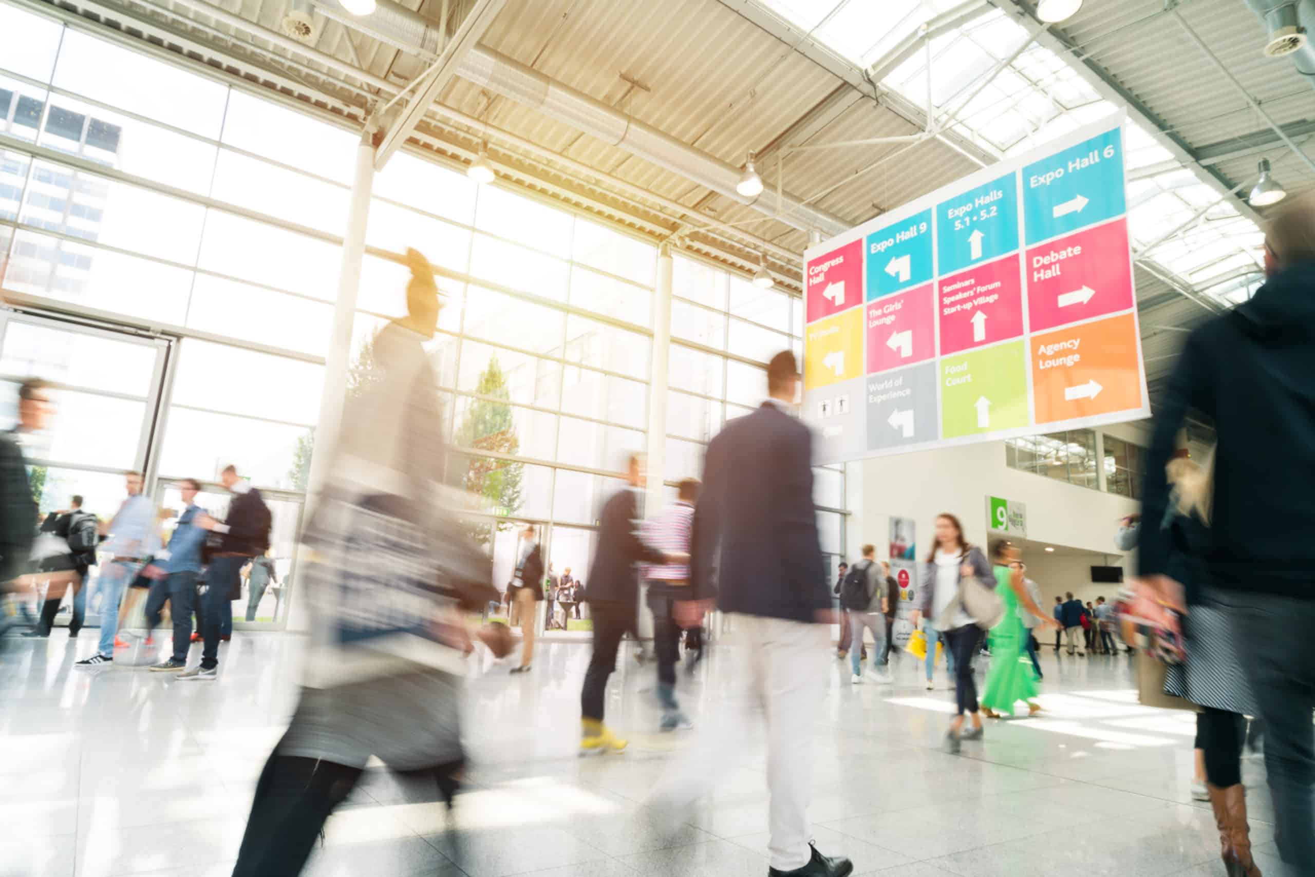 Photo of a crowd in the lobby of an expo