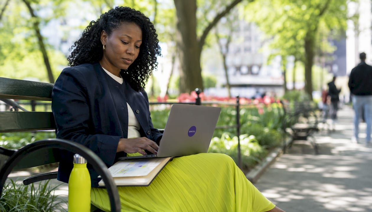 Woman analyzing flash sale campaign at café