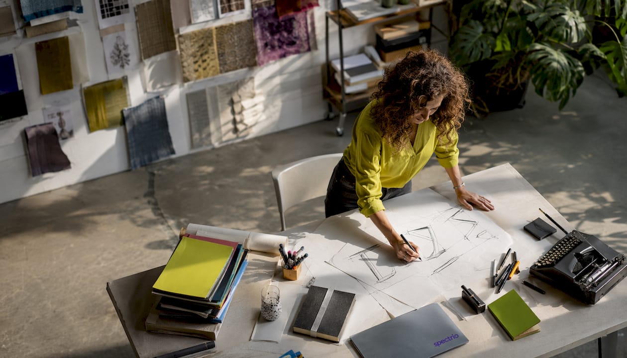 Designer sketching signage content layouts